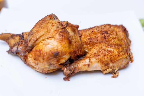 https://admin.kilimanjaro-restaurants.com/storage/gallery/Rotisserie Chicken_1639999179.JPG